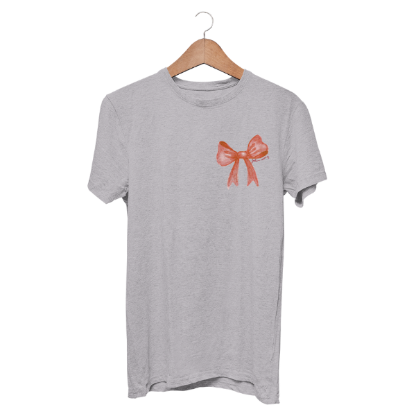“Heather gray holiday t-shirt with small vintage red bow chest print – charity tee donating 5 toys to children in need