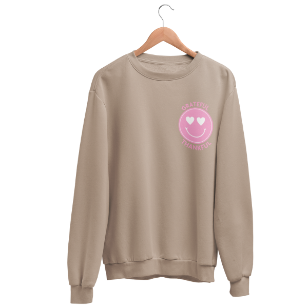 Joyful smiley sweatshirt providing 50 meals for Veterans