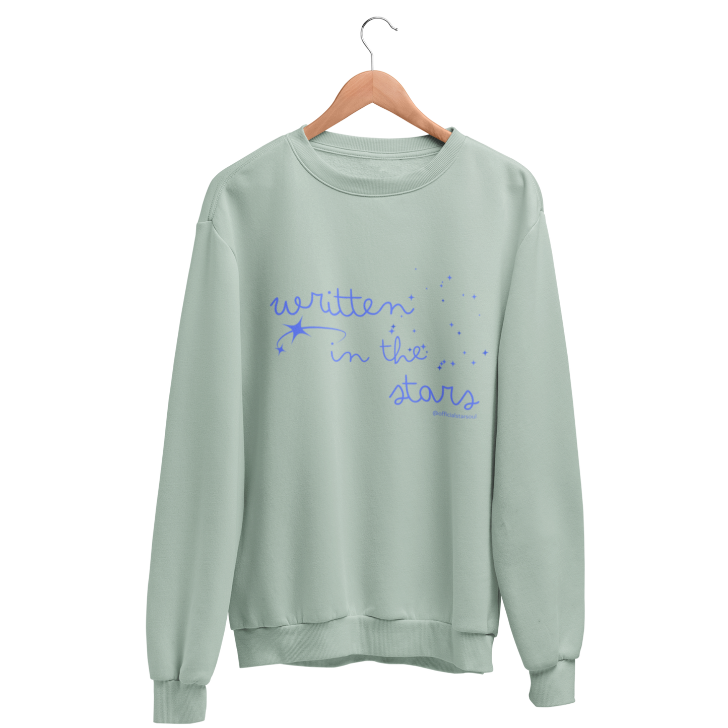 Light green sweatshirt with 'written in the stars' royal blue text