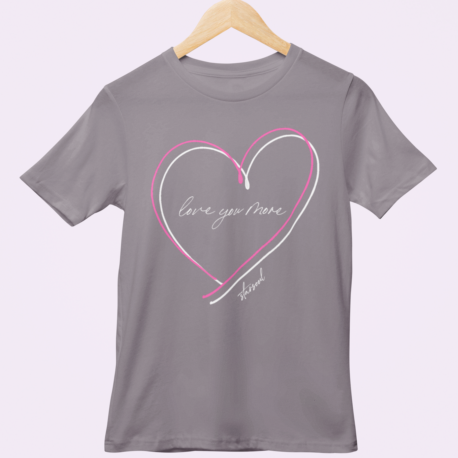 light grey charity t-shirt with pink and white hearts and "love you more" in cursive,benefitting heart disease,  heart disease, love valentine shirt